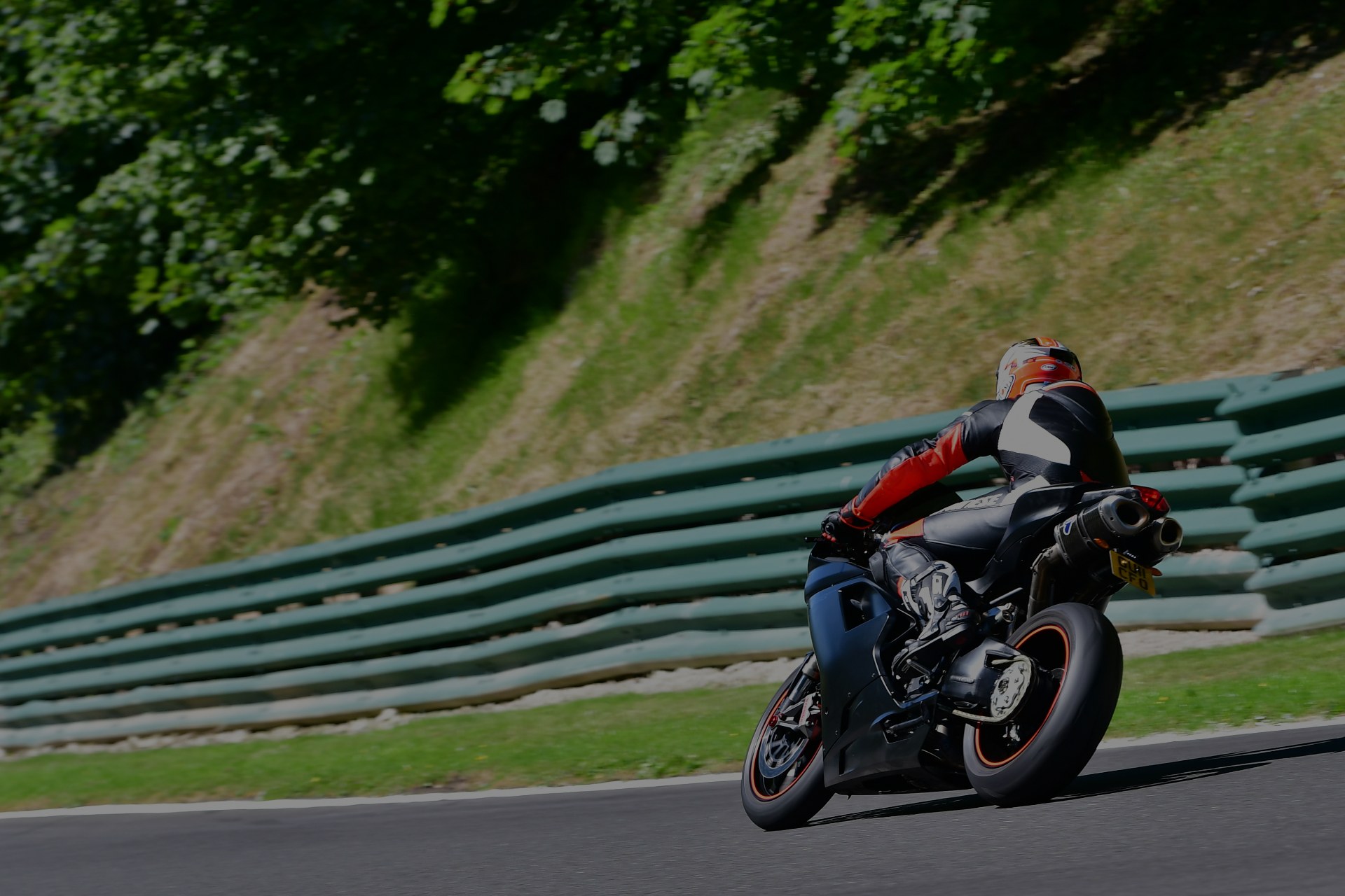 Sportbike leaned through a corner at Cadwell Park